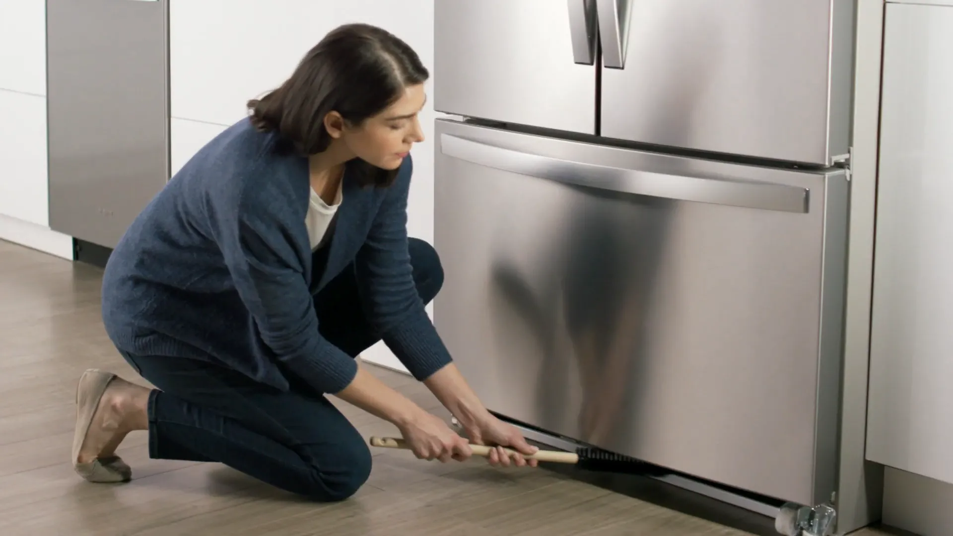 clean under the fridge