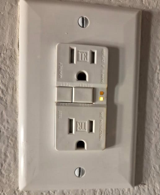 Amber LED light indicates a tripped GFCI receptacle